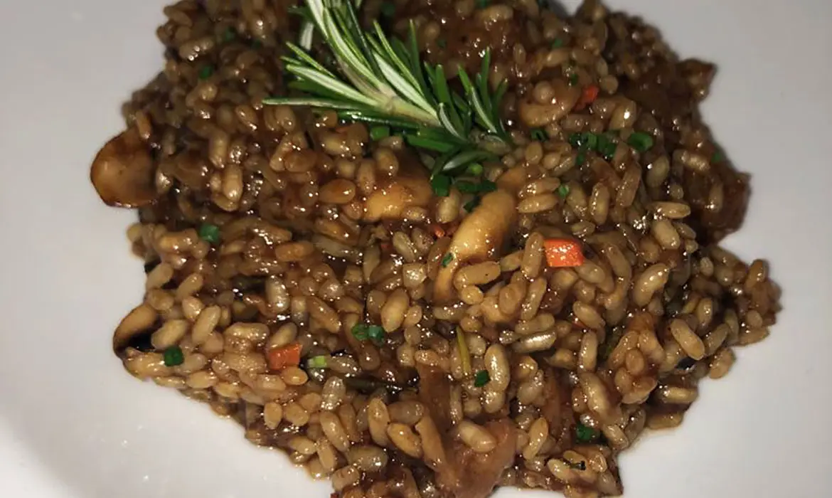 Arroz de espardenyes y manitas de cerdo